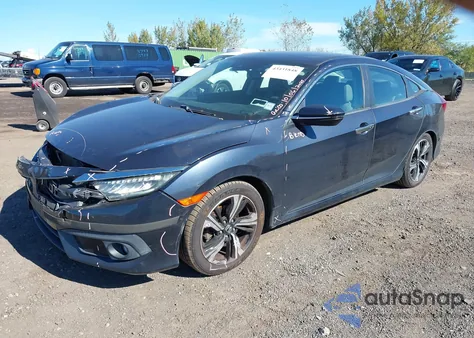 2017 Honda Civic Touring from USA, damaged, VIN 2HGFC1F9XHH642408